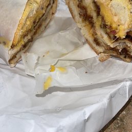 Chicken cutlet bacon American cheese and thousand island dressing on a roll