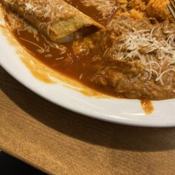 Iguana's Mexican Grill - Inedible enchilada and orange rice and beans