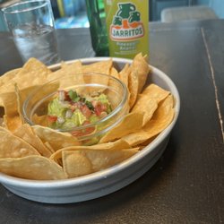 La Taqueria - Some chips & guac with a bottle of jarritos.