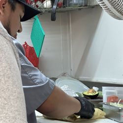 Las Carnalas Mexican Food - Folding burrito perfection