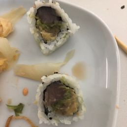 three pieces of sushi on a plate three pieces of sushi on a plate