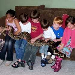 Lizard Lady Reptiles - Lizard Lady engages kids with live Dumeril Boa Constrictor, Raja.