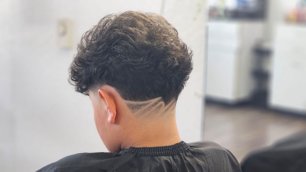 Gomez Barber Shop Logo