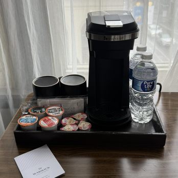Warwick San Francisco - K-cup/Keurig, free water, pods, coffee cups on the desk - Hotels Near Me - San Francisco, California
