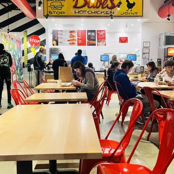 Dave's Hot Chicken - people sitting at tables in a restaurant - Chicken Shop Near Me - Wayne, New Jersey
