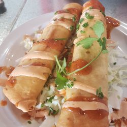 Slapfish - Lobster taquitos.... they are to die for and you NEED to get these!!
