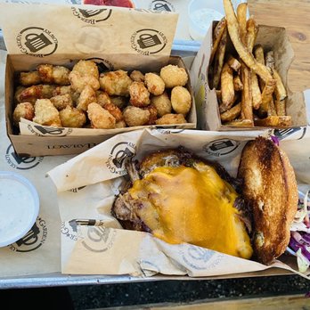 Lowry Beer Garden - Pulled Pork Sandwich, Cheese Curds, Fresh Cut Fries, and house made ranch. Absolutely mouthwatering. - Burgers Near Me - Denver, Colorado