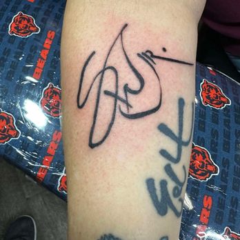 Lone Wolf Tattoo - Stephen Wilson Jr's autograph ... right above Eric Church's :) - Tattoo Near Me - Hermitage, Tennessee