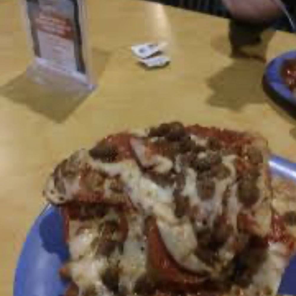 Beltone Hearing Care Center - a plate of pizza - Pizza Near Me - Evansville, Indiana