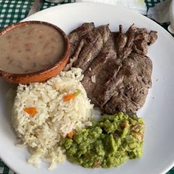 Calypso's - Steak with guacamole, Bean's and rice. Yummy!