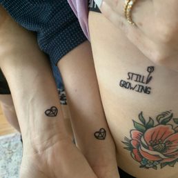the two hearts and the top right tattoos were all done by Murphy the two hearts and the top right tattoos were all done by Murphy