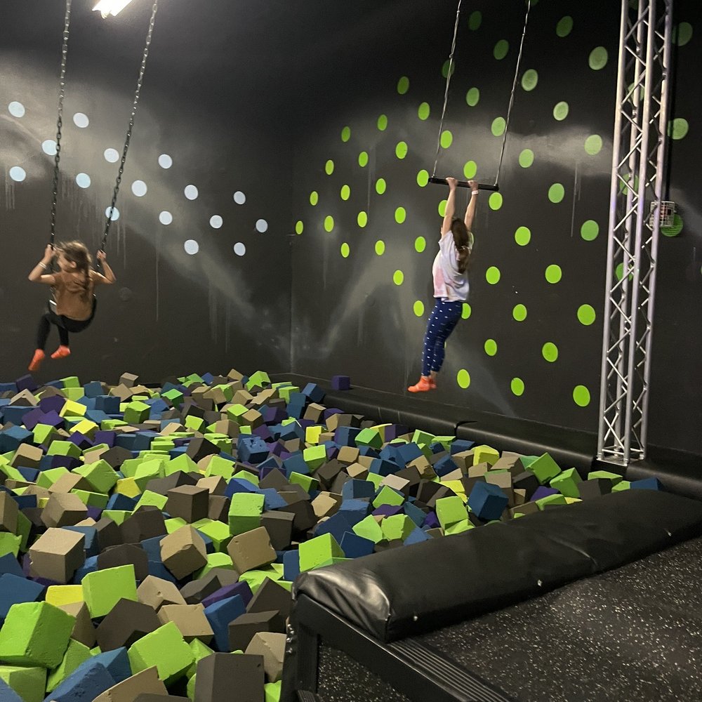 Sky Zone Trampoline Park - Huge foam pit with swing and trapeze bar - Trampoline Parks Near Me - Indianapolis, Indiana Sky Zone Trampoline Park - Huge foam pit with swing and trapeze bar - Trampoline Parks Near Me - Indianapolis, Indiana