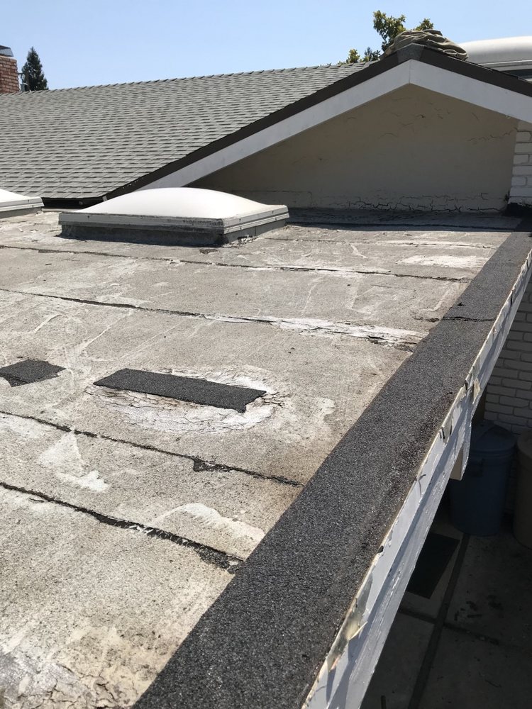 Slide of J V Roofing