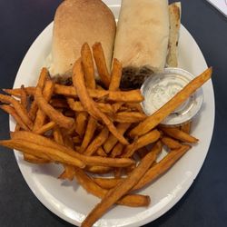 Flancer's Incredible Sandwiches & Pizza - Philly cheese steak sandwich with sweet potato fries