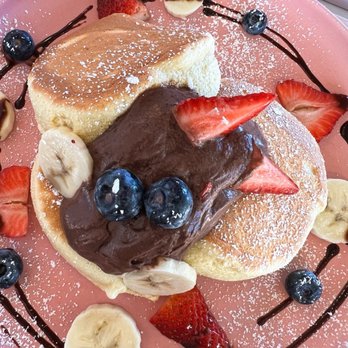 Hanabusa Café - Chocolate Soufflé Pancakes (top view) - fluffy souffle pancake topped with home made chocolate sauce and fresh fruit. - Desserts Near Me - Sunnyvale, California Hanabusa Café - Chocolate Soufflé Pancakes (top view) - fluffy souffle pancake topped with home made chocolate sauce and fresh fruit. - Desserts Near Me - Sunnyvale, California