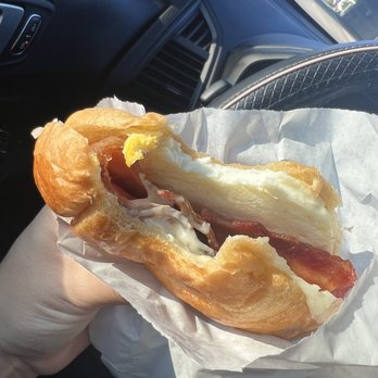 Natalie Donuts - Bacon Egg Swiss Cheese on a soft warm flaky croissant - Donuts Near Me - Houston, Texas Natalie Donuts - Bacon Egg Swiss Cheese on a soft warm flaky croissant - Donuts Near Me - Houston, Texas