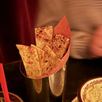 Osteria Cotta - baked flatbread (complementary) - Italian Near Me - New York, New York Osteria Cotta - baked flatbread (complementary) - Italian Near Me - New York, New York