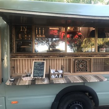 Petite Paris Cafe - a food truck parked in a parking lot - Creperies Near Me Petite Paris Cafe - a food truck parked in a parking lot - Creperies Near Me