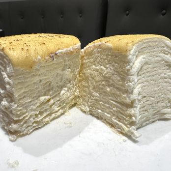 Lady M Cake Boutique - Cross-section of crepe dessert - Desserts Near Me - New York, New York Lady M Cake Boutique - Cross-section of crepe dessert - Desserts Near Me - New York, New York