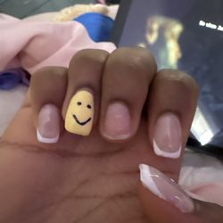 Elaine's Spa & Nails - These didn't even last a week, the pointer finger is also about to pop off, and they cut my finger