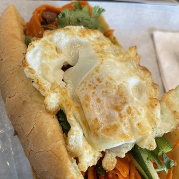 Om Nom Cafe - Beef bulgogi banh mi and took the fried egg from the rice plate - Vietnamese Near Me - Richmond, Texas