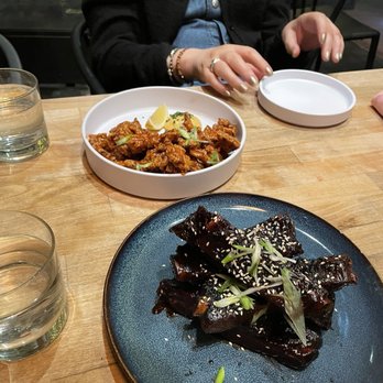 Common Stock - Sticky ribs and karaage chicken bites - New American Near Me - San Diego, California Common Stock - Sticky ribs and karaage chicken bites - New American Near Me - San Diego, California