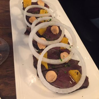 Casa Lolea - semi cured bluefin red tuna w almonds onion & orange - Tapas Bars Near Me - Barcelona, B Casa Lolea - semi cured bluefin red tuna w almonds onion & orange - Tapas Bars Near Me - Barcelona, B