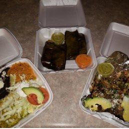 Verde chicken enchiladas, HUGE tamales, Taco Mex-tortillas topped with meat and goodness Verde chicken enchiladas, HUGE tamales, Taco Mex-tortillas topped with meat and goodness