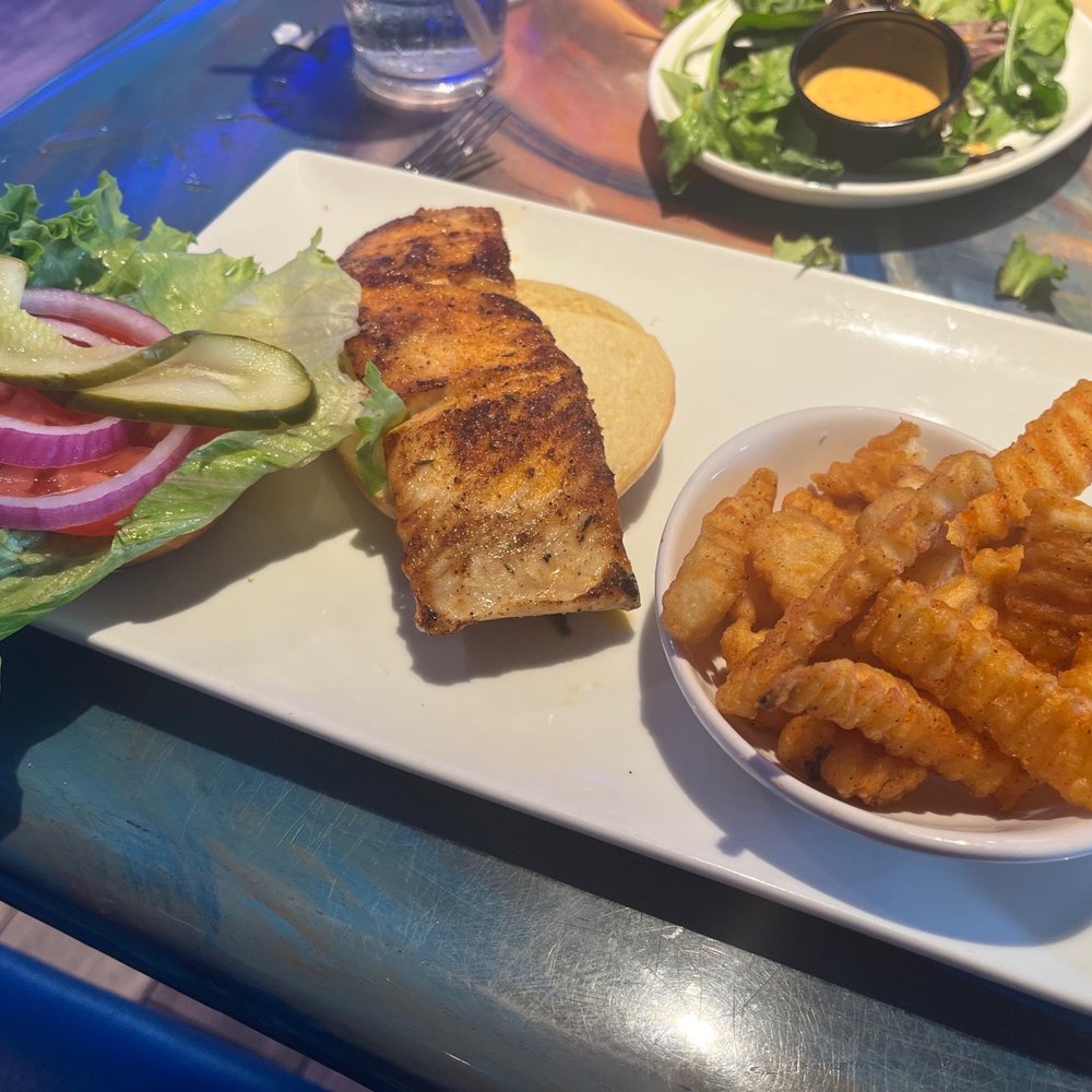 Coconuts On The Beach - Jerked Mahi Sandwich - Bars Near Me - Cocoa Beach, Florida Coconuts On The Beach - Jerked Mahi Sandwich - Bars Near Me - Cocoa Beach, Florida