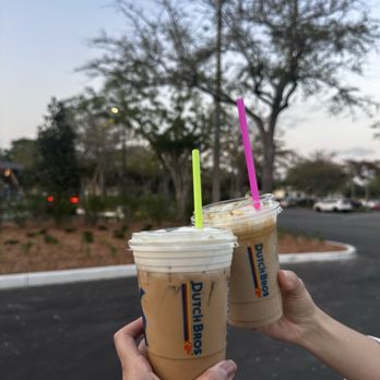 Dutch Bros Coffee - Golden Eagle with whip cream and a Kicker with oat milk and soft top. - Juice Bars & Smoothies Near Me - Orlando, Florida Dutch Bros Coffee - Golden Eagle with whip cream and a Kicker with oat milk and soft top. - Juice Bars & Smoothies Near Me - Orlando, Florida
