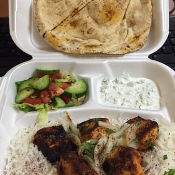 Tonir Cafe - Chicken Breast Kabob with Rice. Sides: Yogurt And Cucumbers Green Salad - Mediterranean Near Me - Burbank, California Tonir Cafe - Chicken Breast Kabob with Rice. Sides: Yogurt And Cucumbers Green Salad - Mediterranean Near Me - Burbank, California