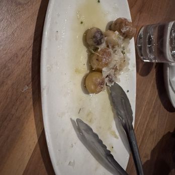 Cut Club - Roasted parm potatoes side, it's a shareable portion. The plate was served full. - Steakhouses Near Me - Seattle, Washington Cut Club - Roasted parm potatoes side, it's a shareable portion. The plate was served full. - Steakhouses Near Me - Seattle, Washington