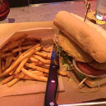 Tricky Fish - Fried catfish po' boy with fries - very filling and the French roll was nice and soft - Seafood Near Me - Richardson, Texas Tricky Fish - Fried catfish po' boy with fries - very filling and the French roll was nice and soft - Seafood Near Me - Richardson, Texas