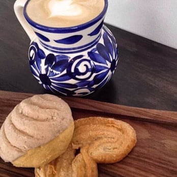 Mi Cafecito Coffee - Masapan Latte with some sweet bread - Coffee & Tea Near Me - Pomona, California Mi Cafecito Coffee - Masapan Latte with some sweet bread - Coffee & Tea Near Me - Pomona, California