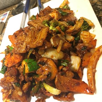 Garlic & Ginger - Flaming pig $27.95 pricey but it is amazing and can definitely serve 2-3 - Korean Near Me - Gainesville, Florida