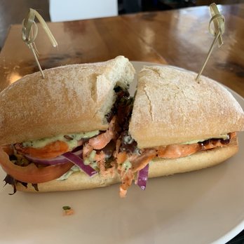 Nye Beach Cafe - Salmon sandwich with pesto cream sauce and balsamic glaze. We upgraded to a Caesar side salad - Cafes Near Me - Newport, Oregon Nye Beach Cafe - Salmon sandwich with pesto cream sauce and balsamic glaze. We upgraded to a Caesar side salad - Cafes Near Me - Newport, Oregon
