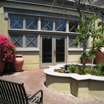 Pico Union Branch Library - modest garden patio with quatrifoil planter - Libraries Near Me - Los Angeles, California