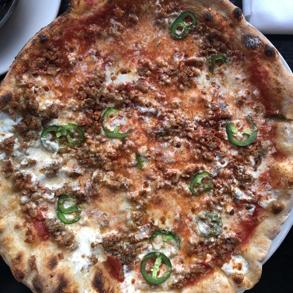 Posto - Sausage pizza (added jalapeños) - Italian Near Me - Somerville, Massachusetts Posto - Sausage pizza (added jalapeños) - Italian Near Me - Somerville, Massachusetts
