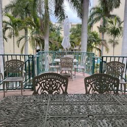 Sunset Cafe & Beach Bar - Covered Patio overlooking condo courtyard with fountains