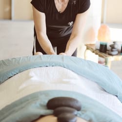 Subtle Rev Massage and Health - Foot rubs and hot stones. a lovely combo.