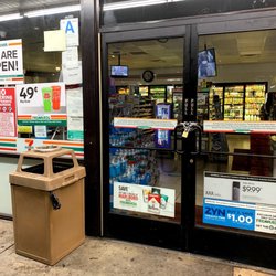 7-Eleven - This lonely 7-Eleven that says that they're open but unfortunately there are padlocks on the doors