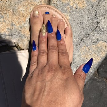 Trendy Nails Spa - My mood changing varsity blue to royal blue and golden glitter gel polish nails School spirit for graduation - Nail Salons Near Me - Fresno, California Trendy Nails Spa - My mood changing varsity blue to royal blue and golden glitter gel polish nails School spirit for graduation - Nail Salons Near Me - Fresno, California