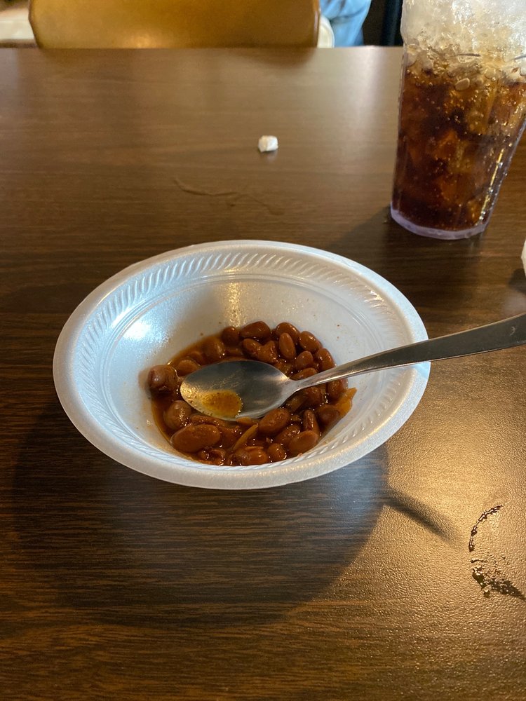 T’s Cafe & Catering Logo