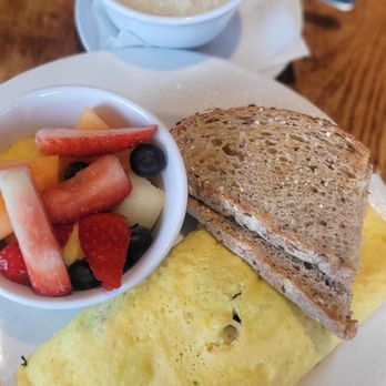 Famous Toastery - Veggie omelet, wheat toast, grits & fruit cup. - Breakfast & Brunch Near Me - Charlotte, North Carolina Famous Toastery - Veggie omelet, wheat toast, grits & fruit cup. - Breakfast & Brunch Near Me - Charlotte, North Carolina