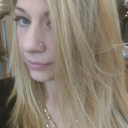 Erika gave me layers, a trim, and blonde highlights.
