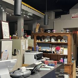 Siamese Basil Thai Restaurant - The inside, full of trinkets and family history. Takeout only! But there are talks of reopening dining.