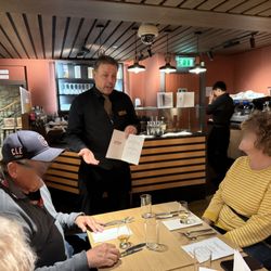 Amber Restaurant - One of the connoisseurs walking through the tasting program.