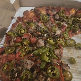 Pepperoni, sausage, jalapeño pizza Pepperoni, sausage, jalapeño pizza