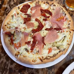 Velvet Elvis at La Misión - Chicken saltimbocca 10in pizza with added artichoke hearts (+$2).