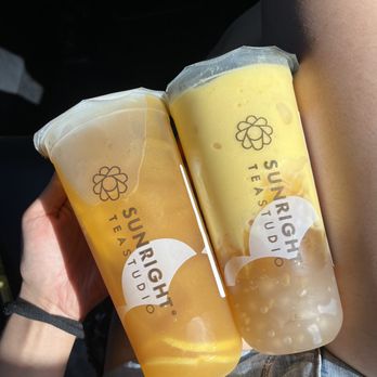 Sunright Tea Studio - Sunright Fruit Tea w/ Lychee Jelly on the Left | Mango Frostie w/ Jasmine Tea Jelly & Honey Boba on the Right - Bubble Tea Near Me - Garden Grove, California